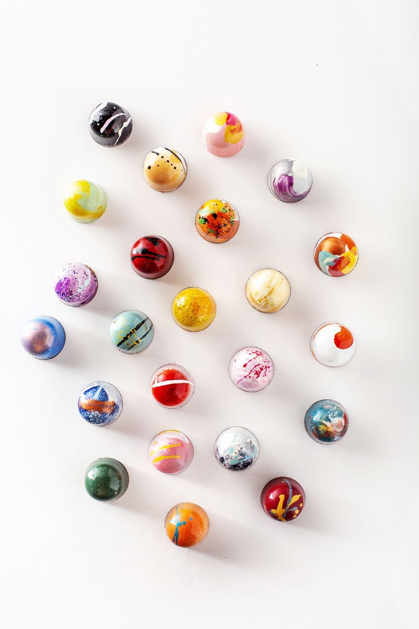 Hand-painted Aline Nasseh bonbons — Salted Caramel, Sour Cherry, Cardamom, Espresso
